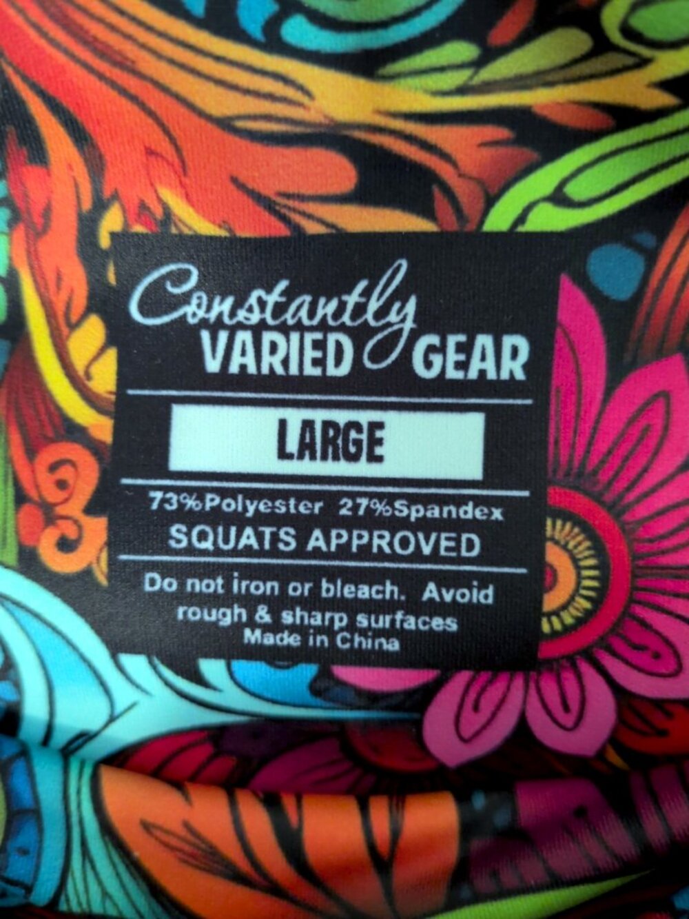 CVG Constantly Varied Gear paisley floral rainbow gym shorts 2.5" L pockets NWOT - Picture 4 of 4